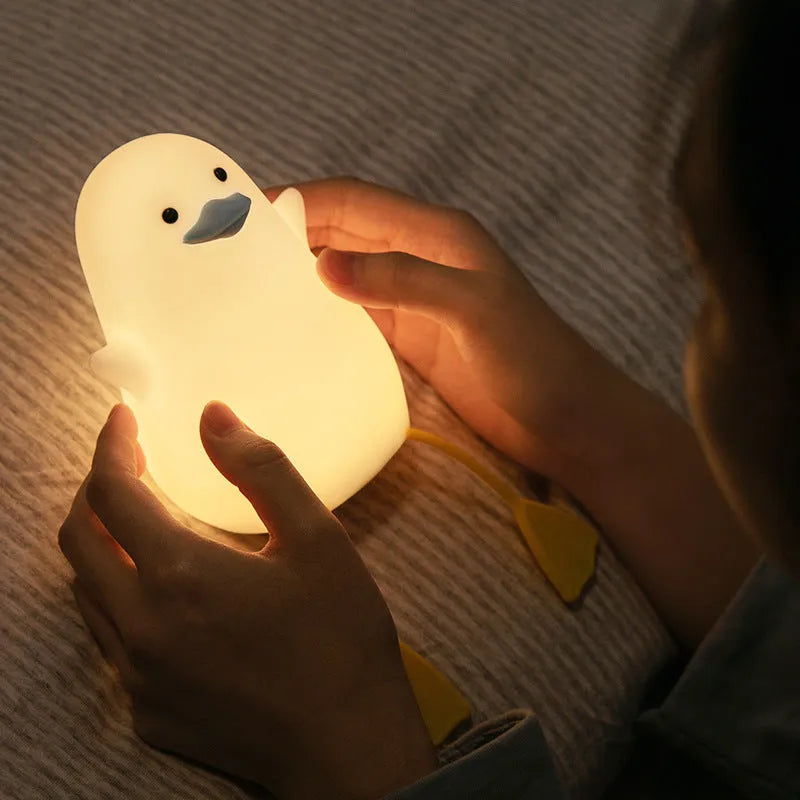 Seagull-shaped silicone night light for babies with soft glow and tap controls
