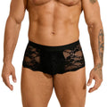 Men's black lace briefs with hollow-out see-through panels laid flat