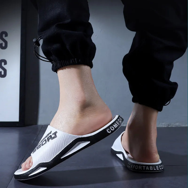 Unisex non-slip PVC beach bathroom slippers in black, open toe, youth trend style