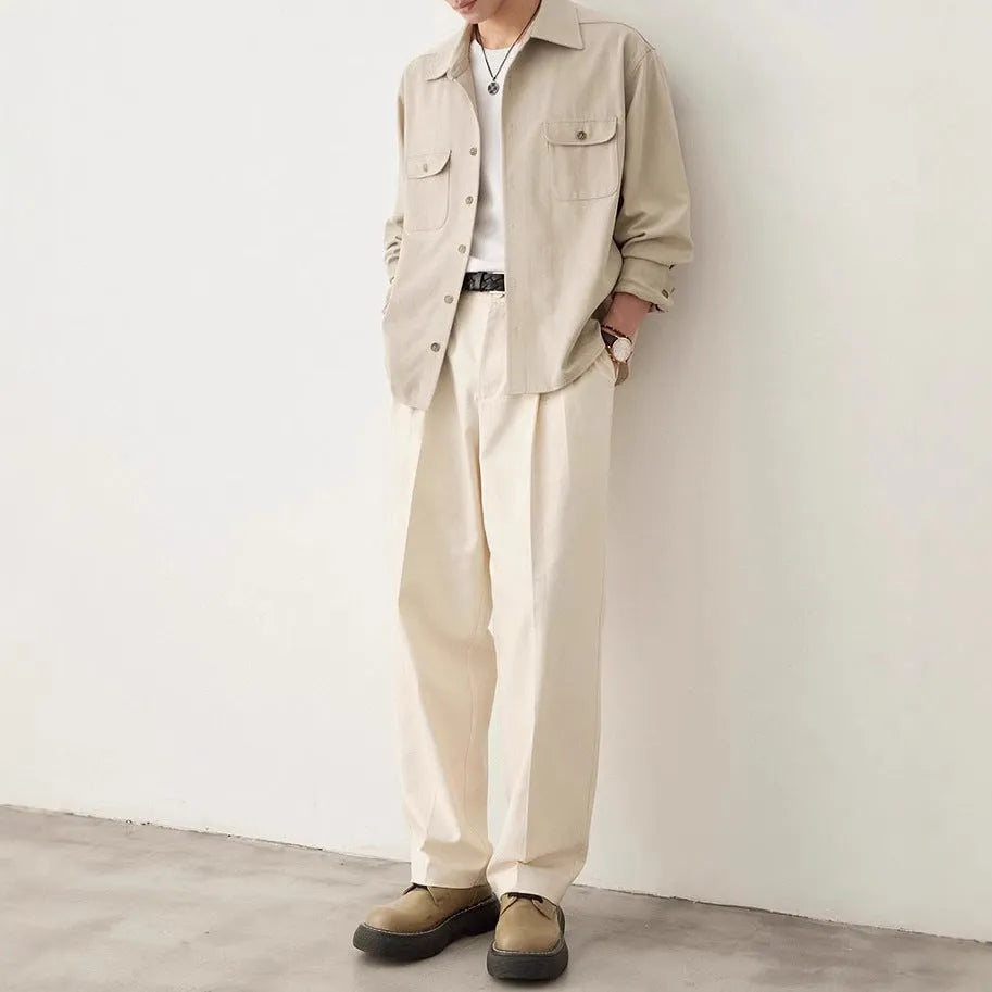 Men's casual shirt with a cotton lapel in light sand rice colour, showing long sleeves and simple design.