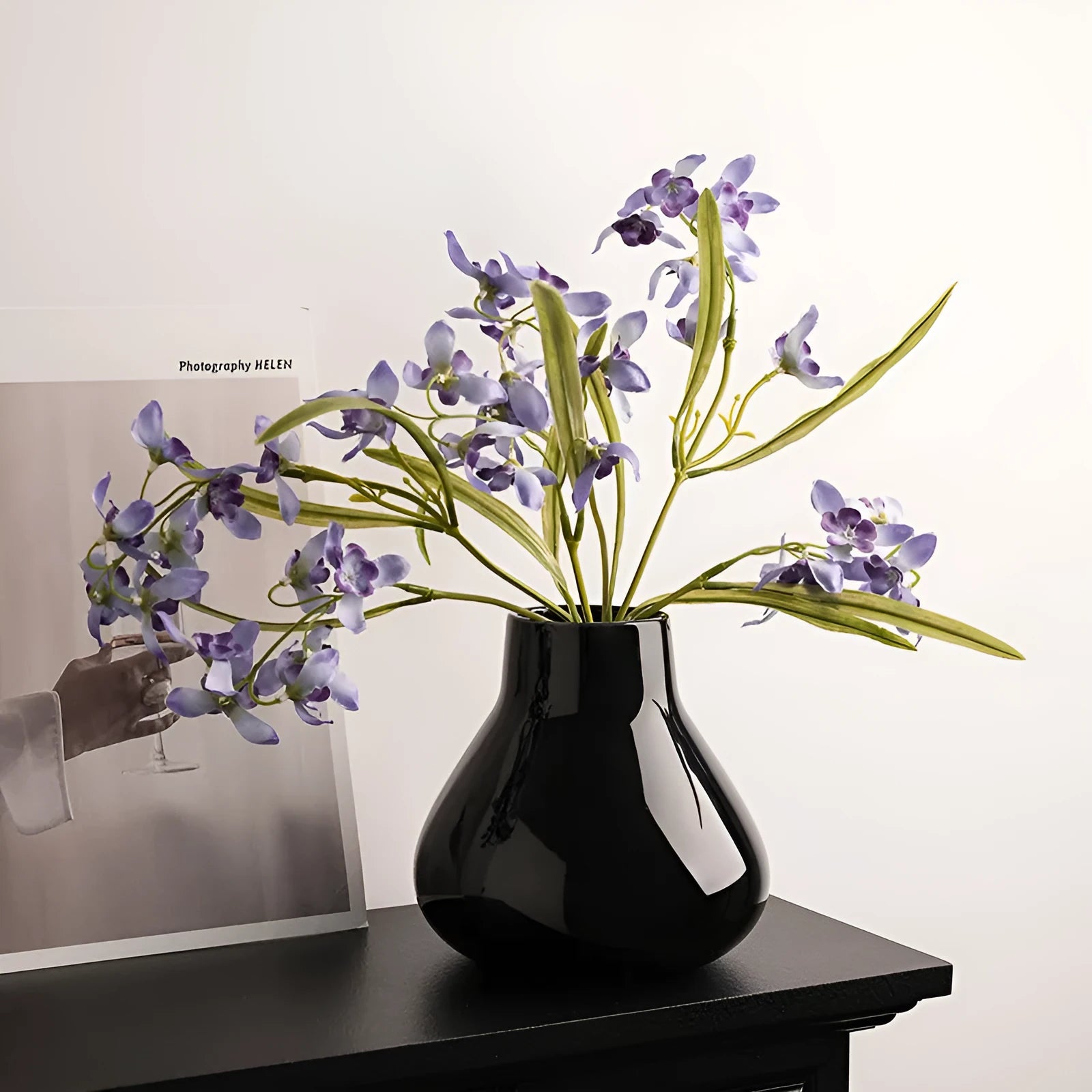 Ceramic round belly vase with black or white coloured glaze finish and modern simplicity design