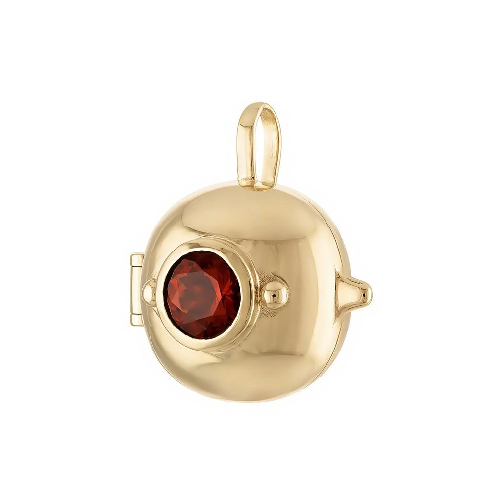 Gold-plated copper teapot pendant necklace with round red gemstone accent on regular chain, opened to show storage compartment