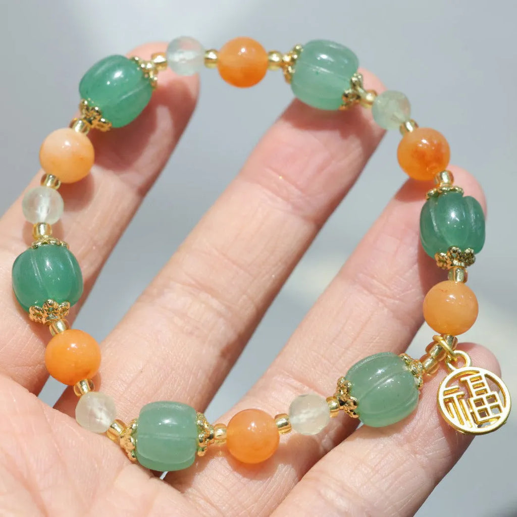 Women's Chinese style Duobao pumpkin bracelet made of Jinsi Jade and Prehnite beads.