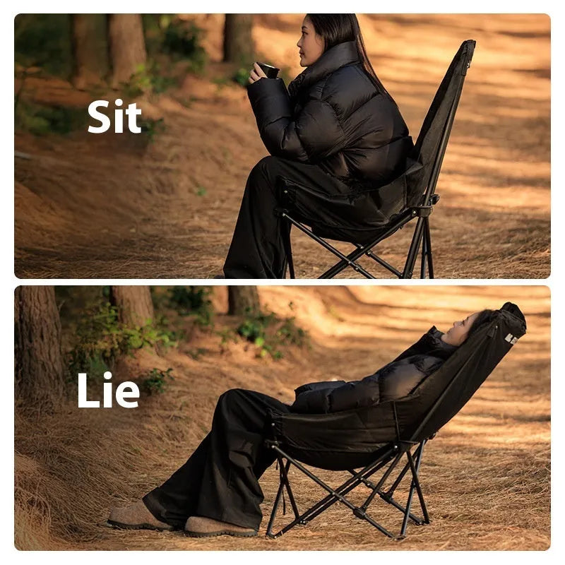 Night black portable folding camping recliner chair with a thickened seat in a moon chair style.