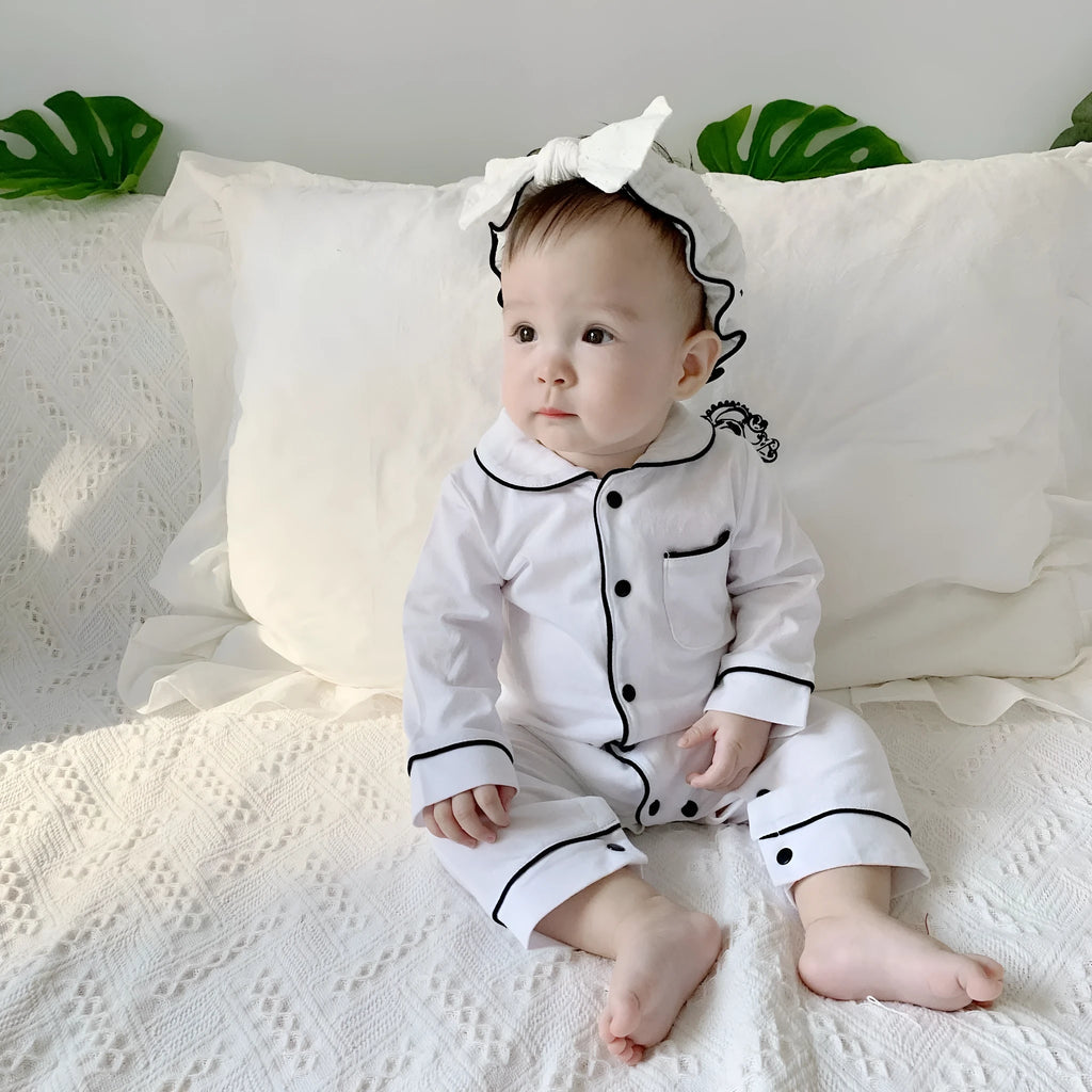Solid colour baby cotton onesie pyjama in grey, long sleeve with single-breasted closure