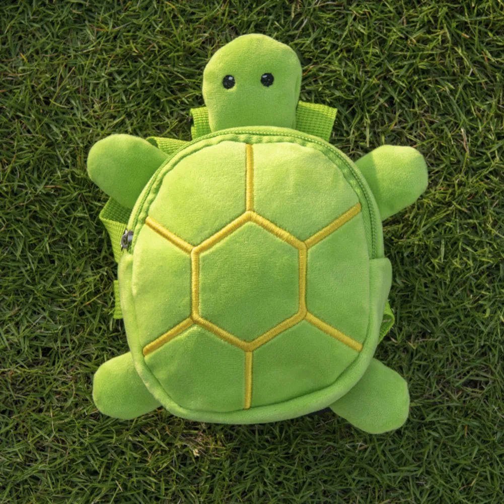 Turtle-shaped dog backpack harness in green colour with metal zipper
