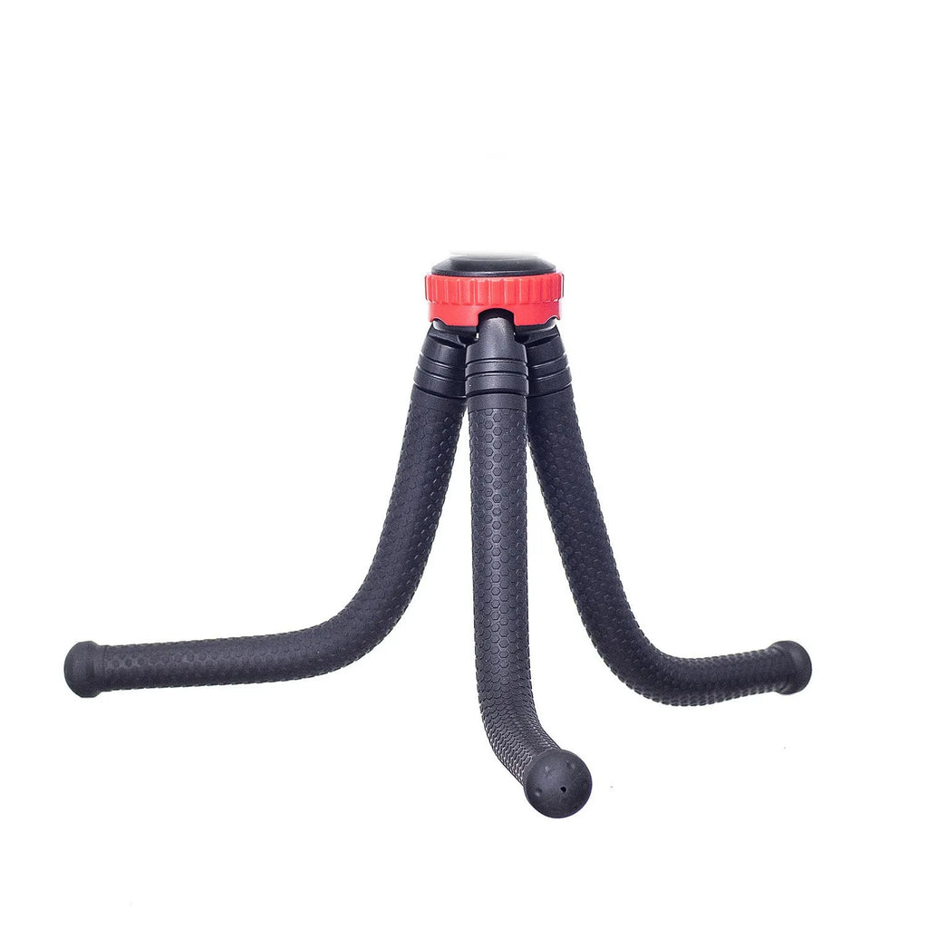 Black octopus tripod with flexible rubber legs wrapped around a pole holding a camera