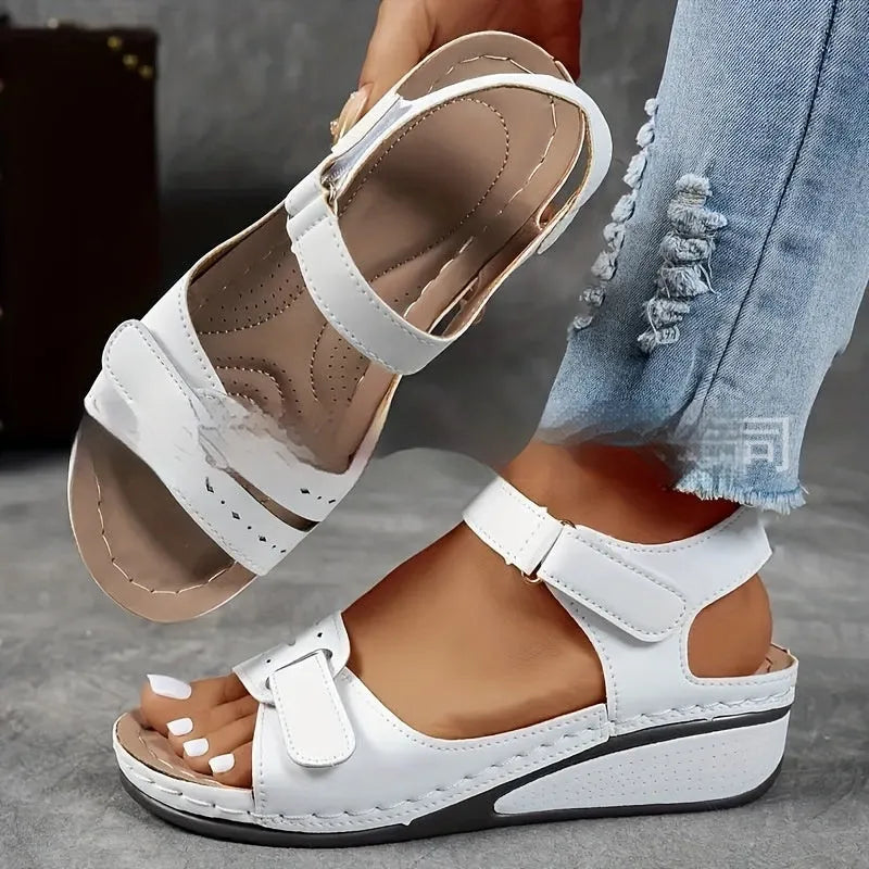 Beige plus size strap sandals with a thick composite sole and adjustable Velcro fastening on a white background