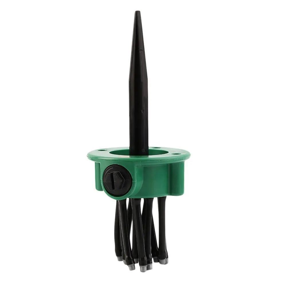 Green adjustable lawn sprinkler with bendable nozzles on 9 cm circular base