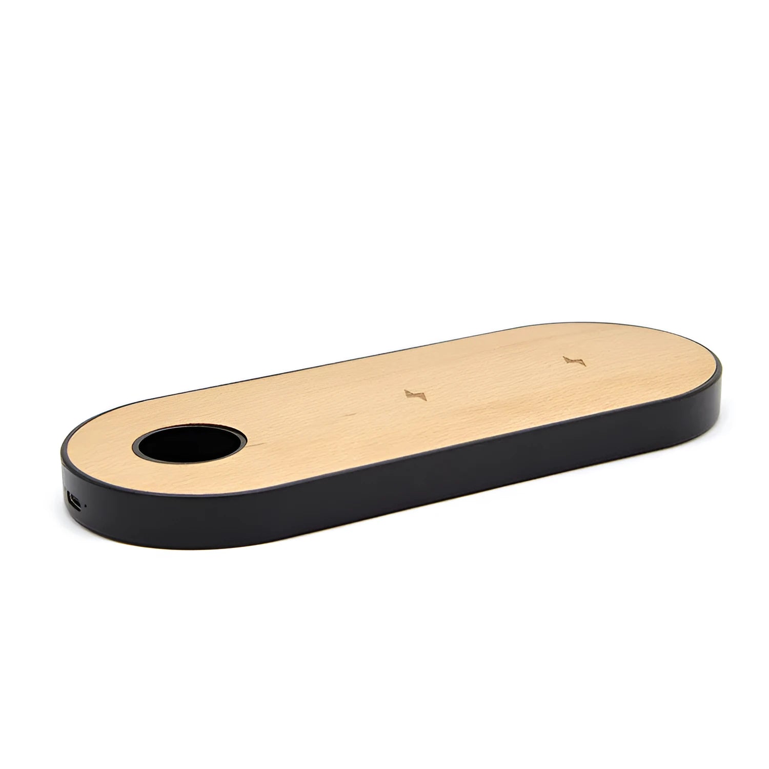 Natural bamboo wireless charging pad with wood accents on desk surface