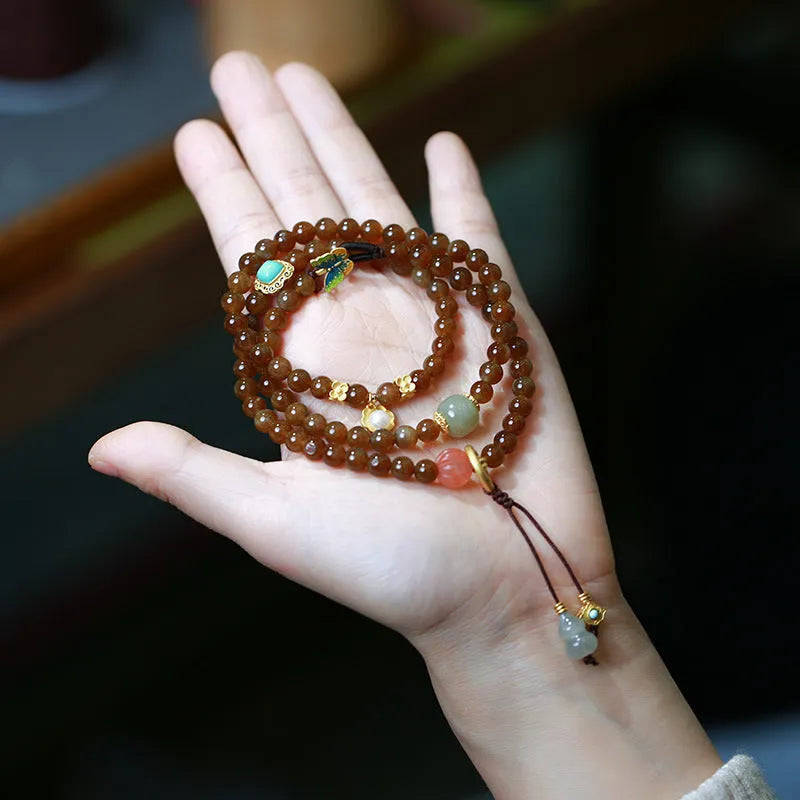 Brown jade Hetian three-ring bracelet with geometric design and silver-plated accessories