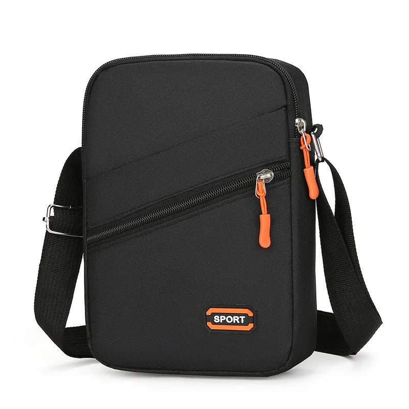 Solid colour Oxford cloth commuter bag with contrast stitching, shown with crossbody strap.