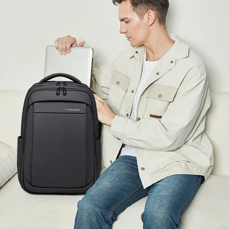Large capacity Oxford cloth backpack for commuting and travel in black with 16-inch laptop compartment and air cushion strap