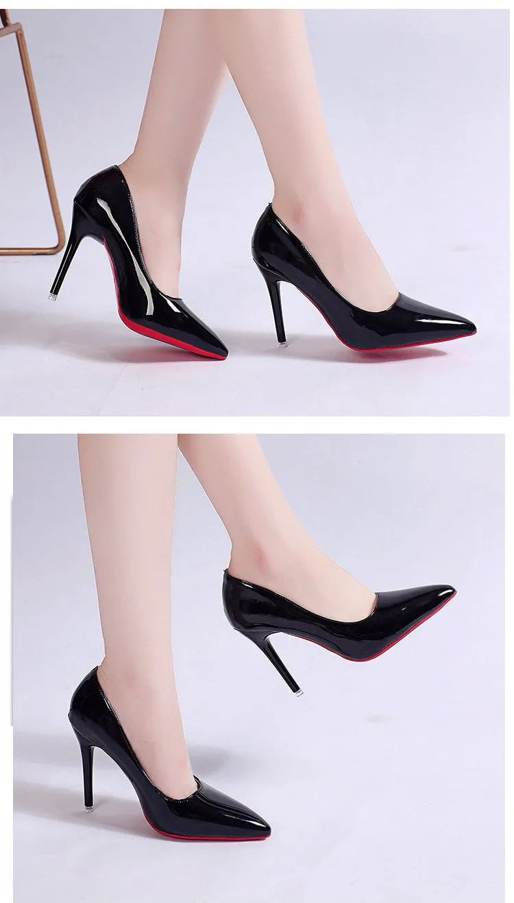 Women's black stiletto heel pump with pointed toe and shallow cut on a white background.