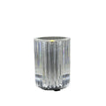 Compact acrylic crystal LED table lamp with RGB colours and remote control on a desk