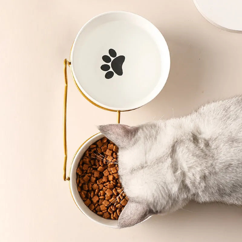 Ceramic cat bowl with iron frame stand in cat footprints pattern