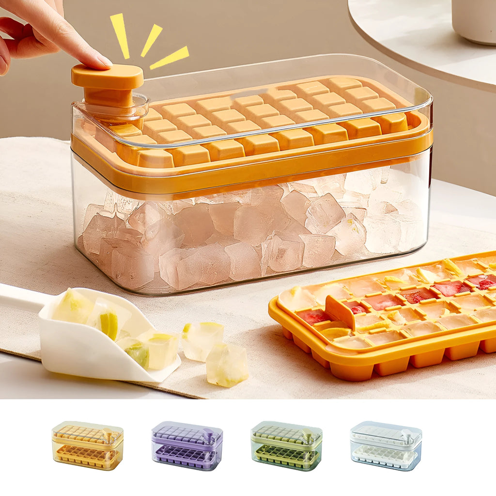 Green one-button press ice cube tray and storage box with lid on a kitchen counter
