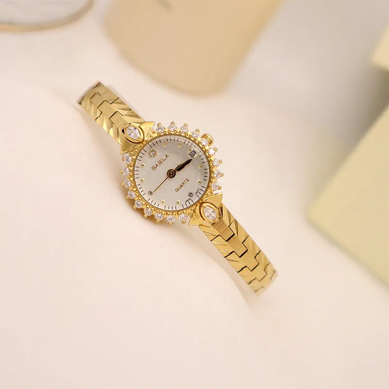 Women's quartz bracelet watch with gold dial and 5A diamond embossed pattern