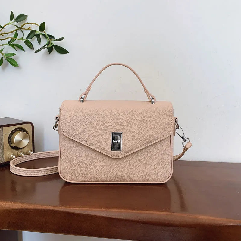 Horizontal square PU leather shoulder messenger bag with sewing thread detail in five colours including milky white and black