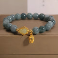 Sky blue natural stone gourd lotus flower pendant on a women's adjustable bracelet with electroplated metal.