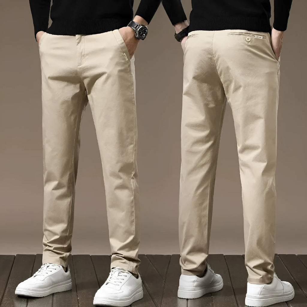 Men combed cotton light business casual trousers in black, side view showing mid-waist cut and fabric texture