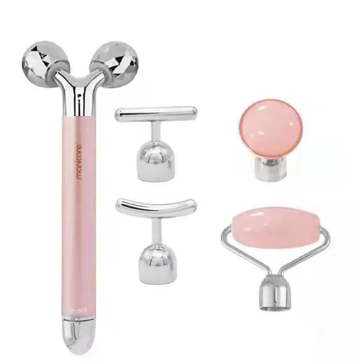 Rose gold five-in-one vibrating face massager with jade roller, disc, U-shaped and T-shaped beauty heads in colour box