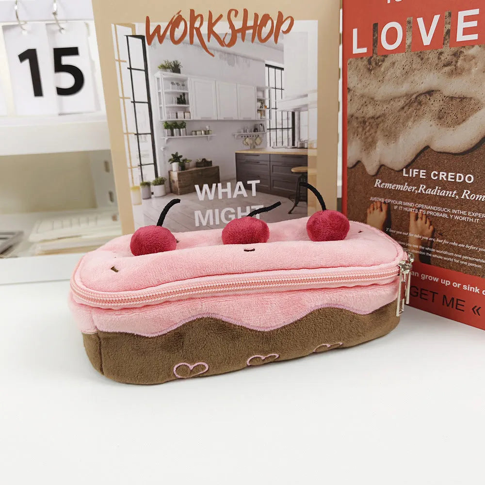 Cherry Cake coloured velvet plush pencil bag in Korean style on a surface.