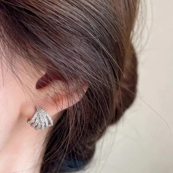 Geometric zircon earrings with platinum electroplated finish and line design