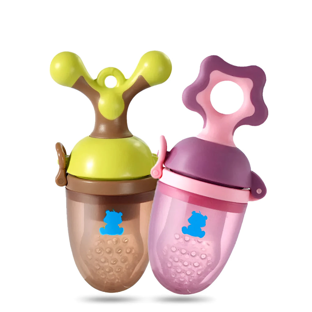 Green and purple polypropylene baby bite trainer with textured surface and easy-grip handle