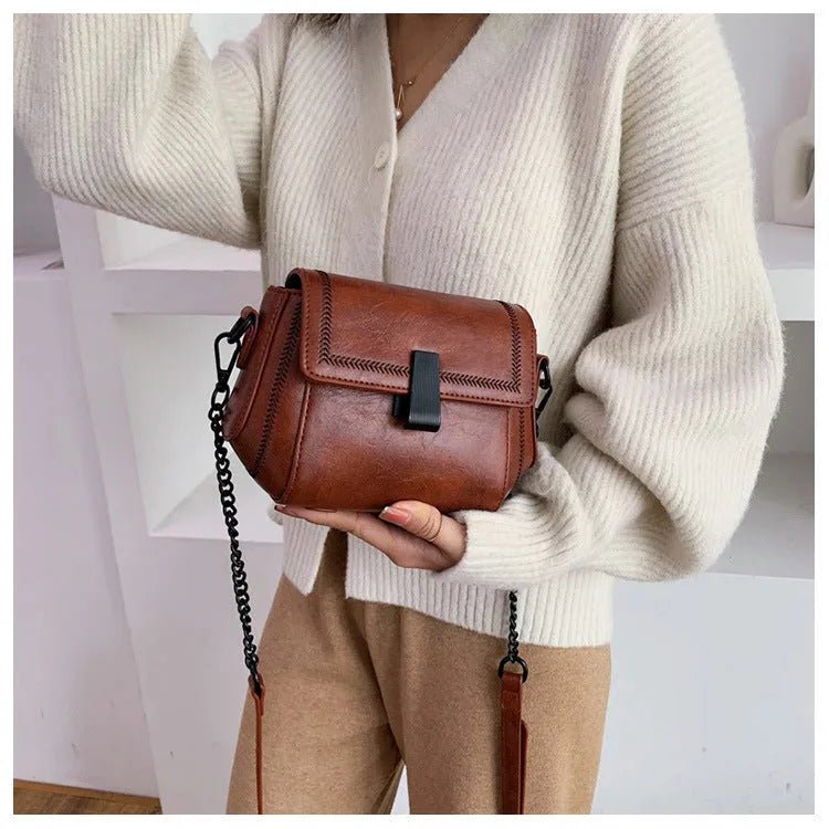 Korean style PU shoulder crossbody bag in beige with clamshell opening and crossbody strap