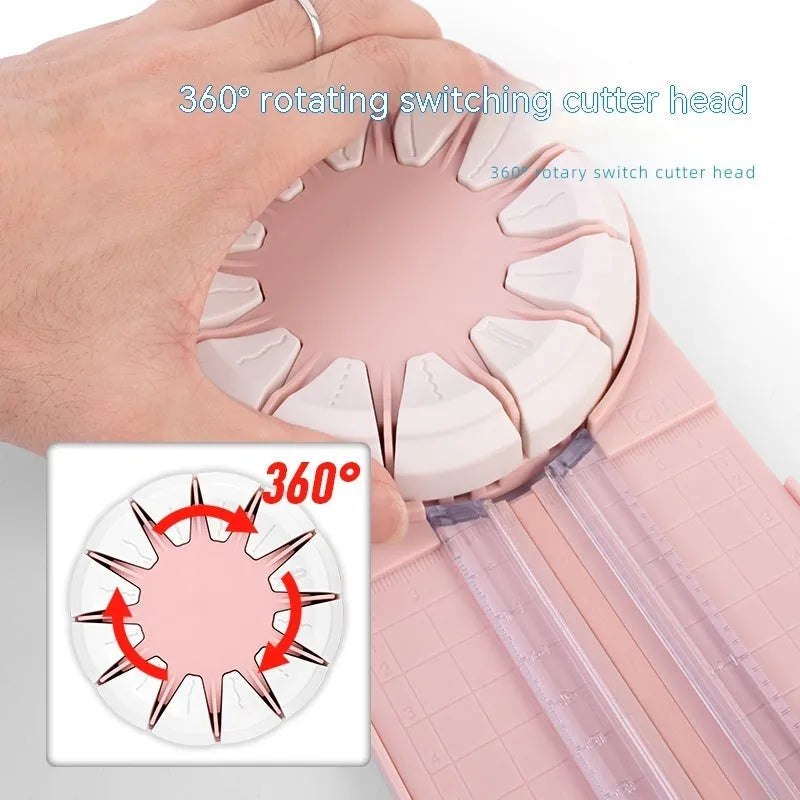 Pink and black 12-in-1 multifunctional plastic paper cutting machine on a desk