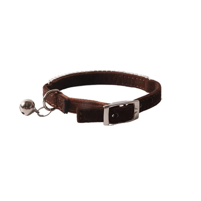Flannel cat collar with elastic buckle and textured gang drill design in multiple colours.