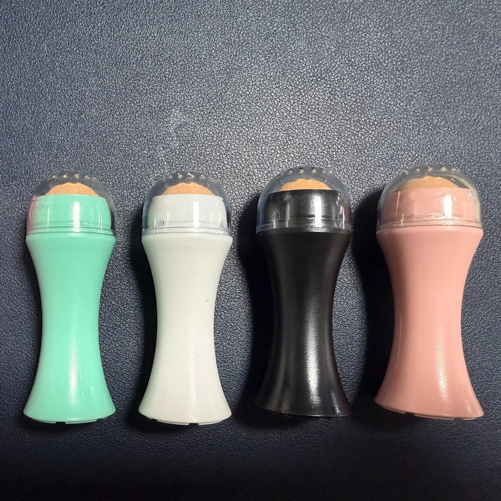 Portable volcanic stone facial roller for oily skin control in choice of colours.