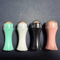 Portable volcanic stone facial roller for oily skin control in choice of colours.