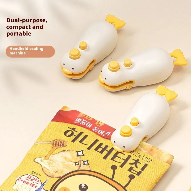 Small yellow duck-shaped rechargeable heat sealing machine with charging cable