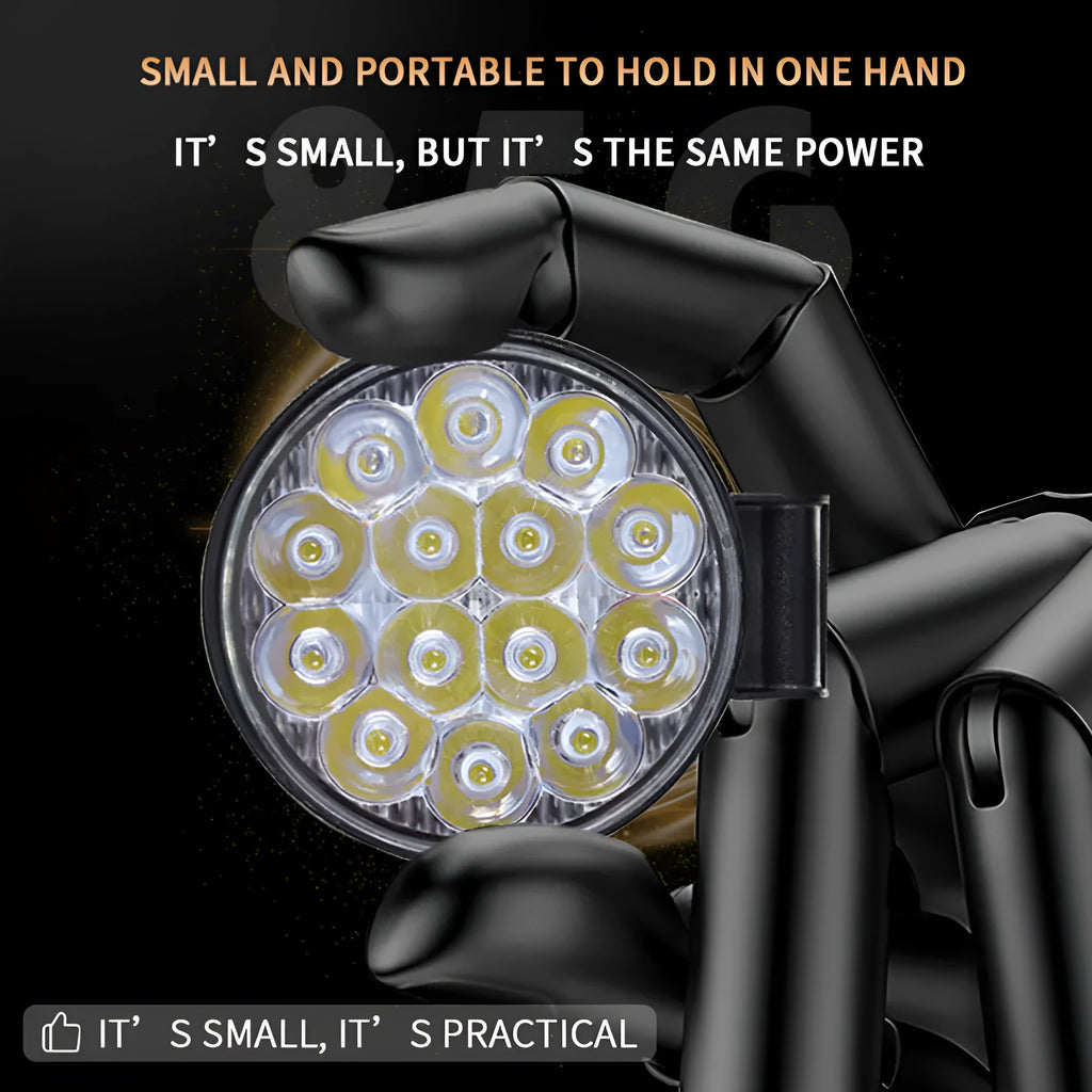 Compact round aluminium LED work light with white light, suitable for vehicle mounting.
