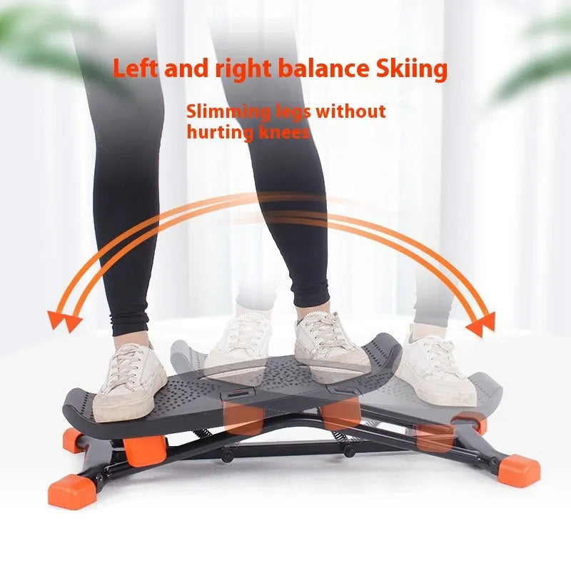 Black mini fitness skiing machine with elastic hand straps for home exercise