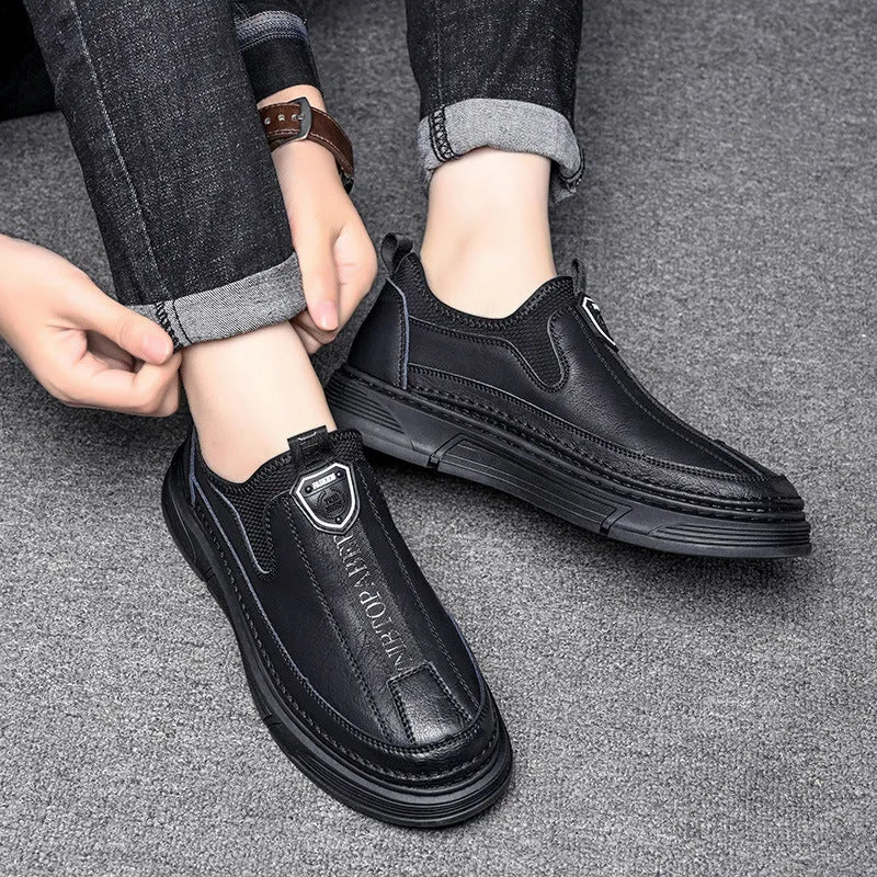 Men's solid colour leather casual shoes with round toe design in black or brown options