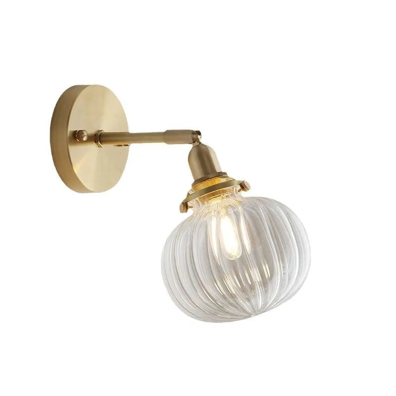 Pumpkin-shaped glass wall lamp in blue and transparent water ripple glass finishes.