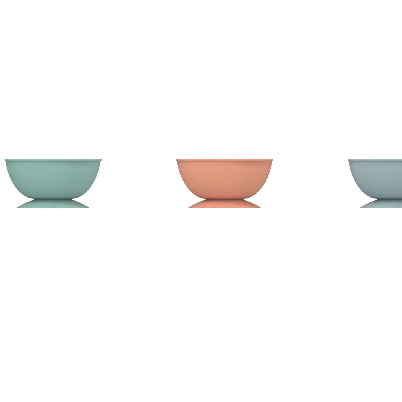 Cyan silicone slow feeding dog bowl with suction cup base showing textured surface