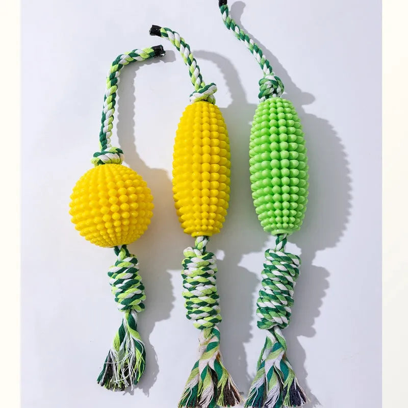 Corn-shaped dog chew toys in yellow and green with rope knots and a yellow ball for small to medium dogs