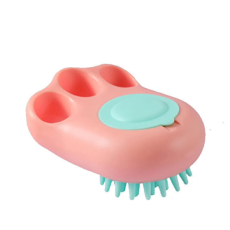 Claw-shaped silicone bath brush for dogs and cats in blue, pink, white, or yellow.
