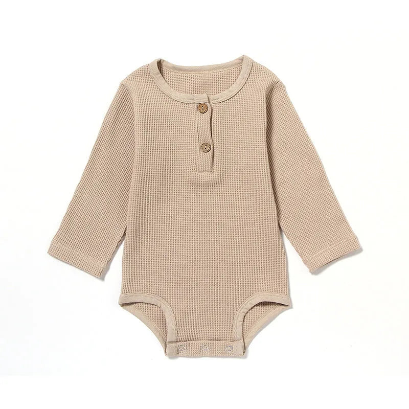Waffle cotton baby long sleeve romper in beige with cotton rope closure