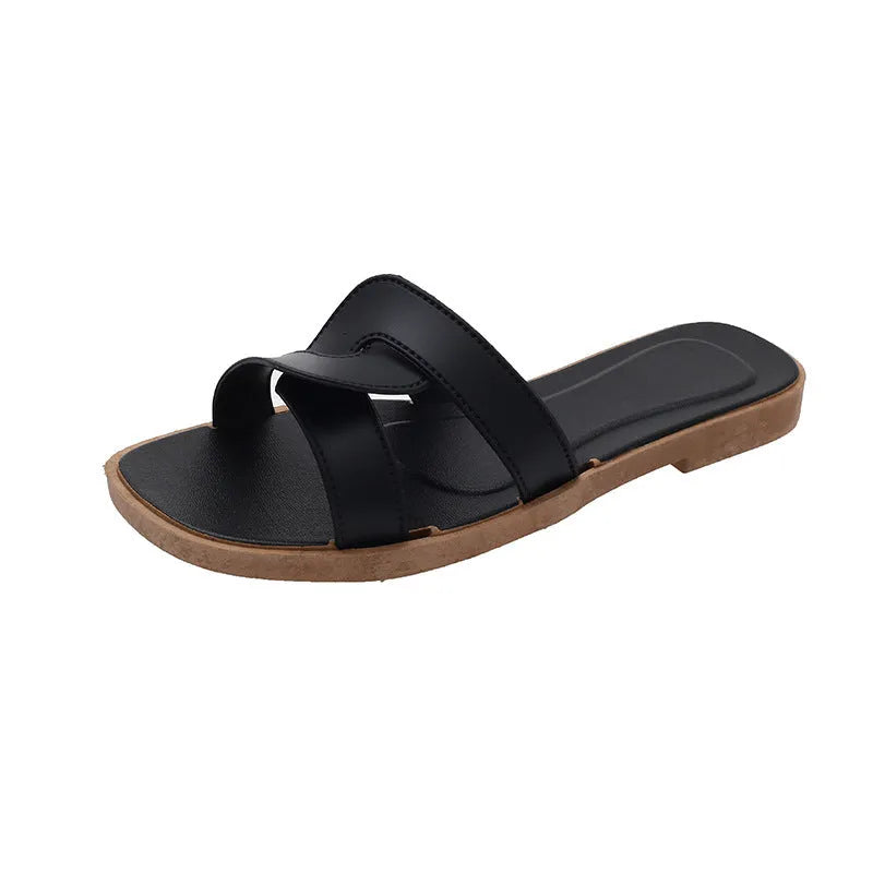 Women's PVC cross strap non-slip sandals in beige white colour on a plain background