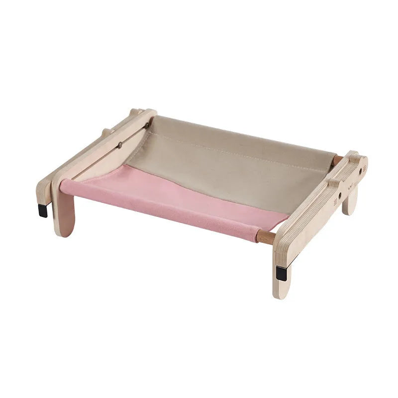 Solid wood cat bed with washable cover in grey-blue colour option on floor