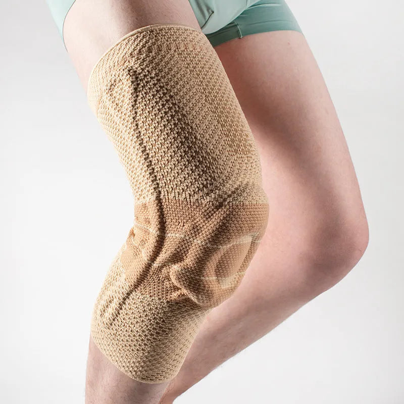 Adult sports kneecaps in black and blue colour, made from nylon and spandex material.