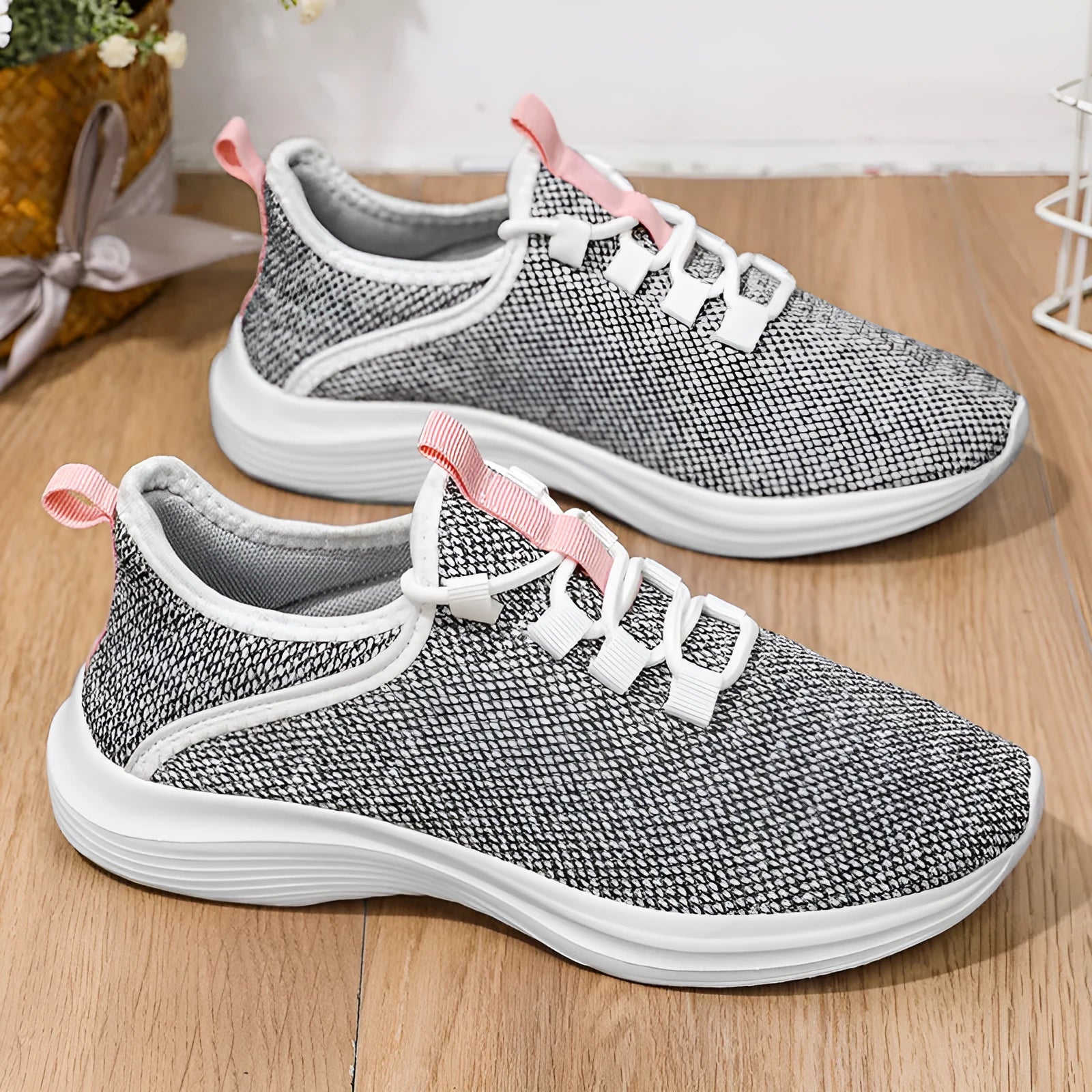 Women's low-top casual sneaker in grey mesh with a round toe and lace-up front.