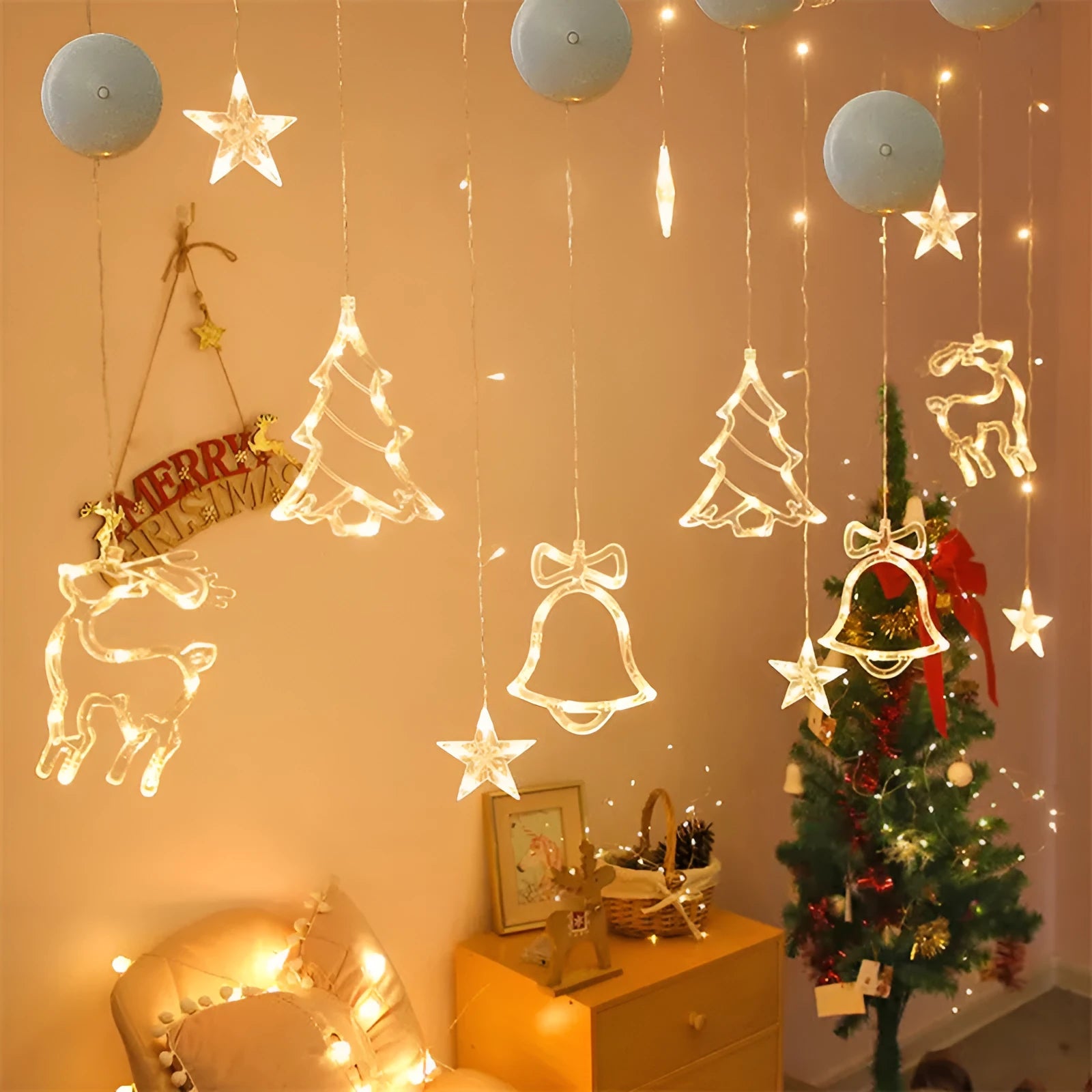 Battery-powered Christmas LED chandelier light with suction cups, showing Santa Claus design.