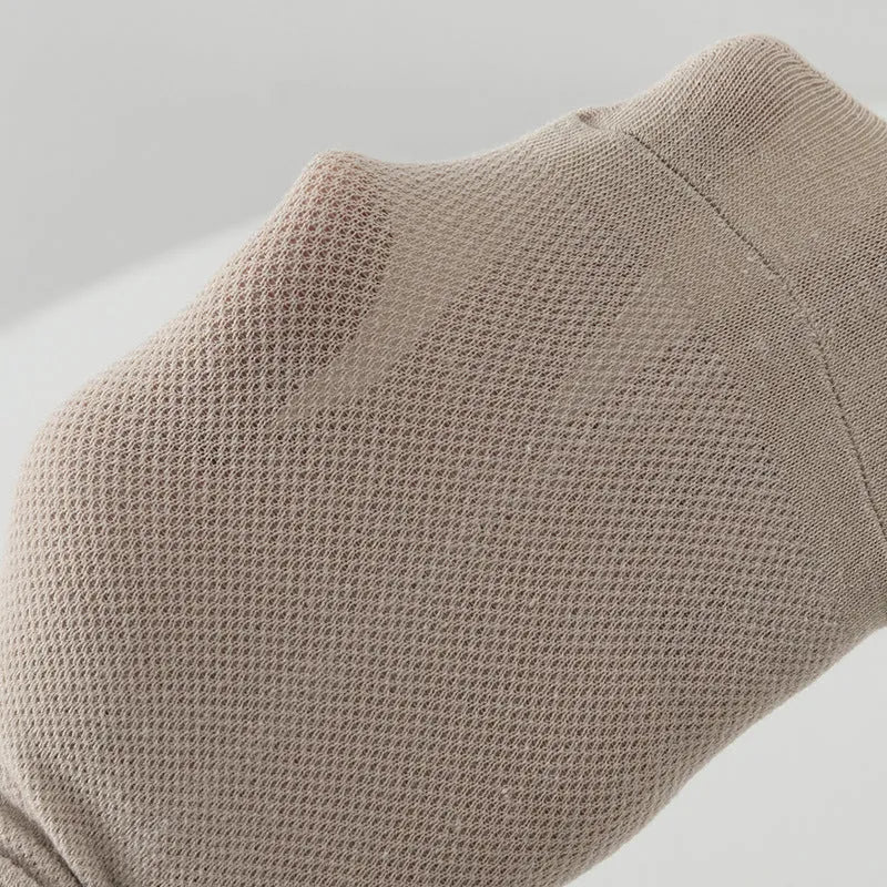 Men's solid colour low-cut polyester boat socks in various colours on white background