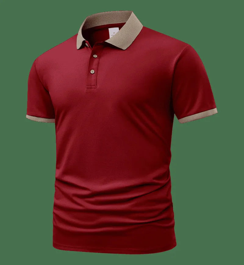 A green ice silk polo shirt with short sleeves and a flocked design on the front, laid flat.